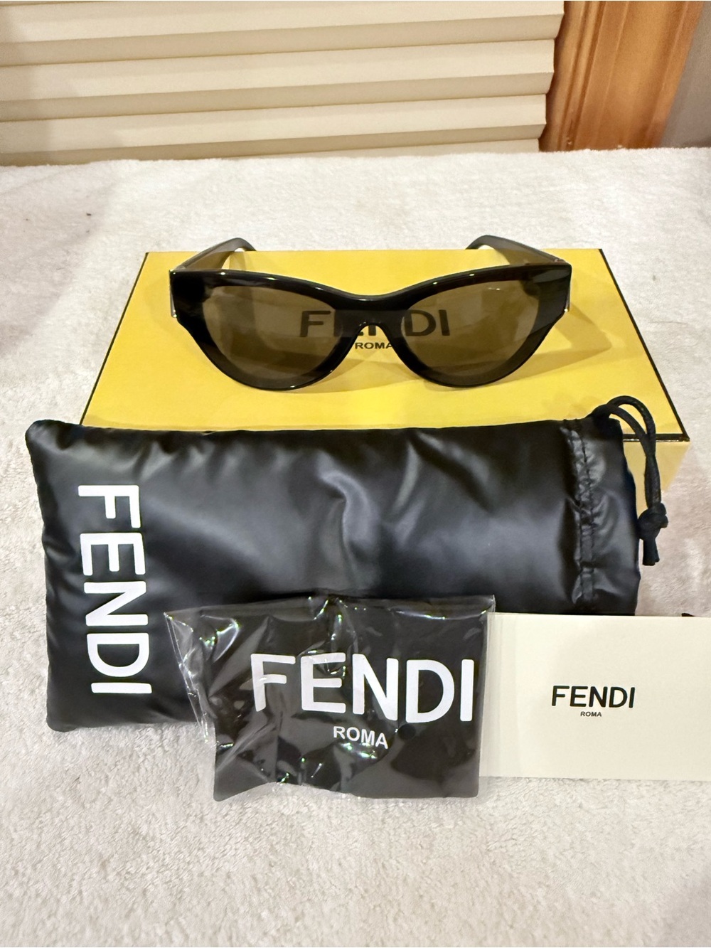 Fendi Black Frame Sunglasses with Dark Tinted Lenses